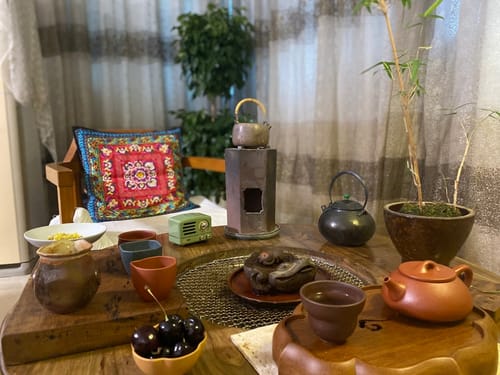 Customer photo review of Yixing Purple Clay Five Blessings Tea Set
