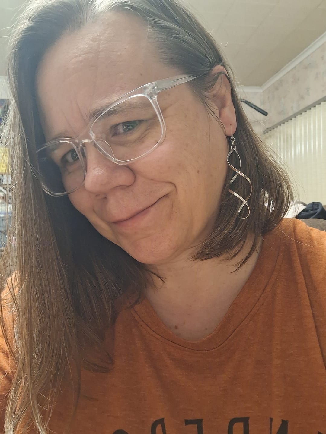 Customer photo review of Infinity Spiral Dangles Hypoallergenic Earrings for Sensitive Ears Made with Plastic Posts