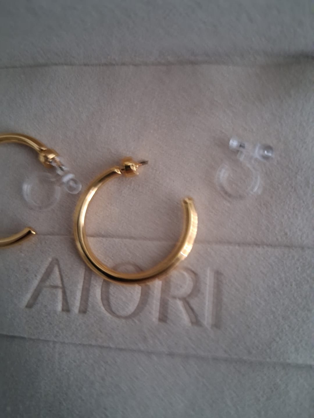 Customer photo review of Medium Thin Hoop Clip On Earrings in Gold