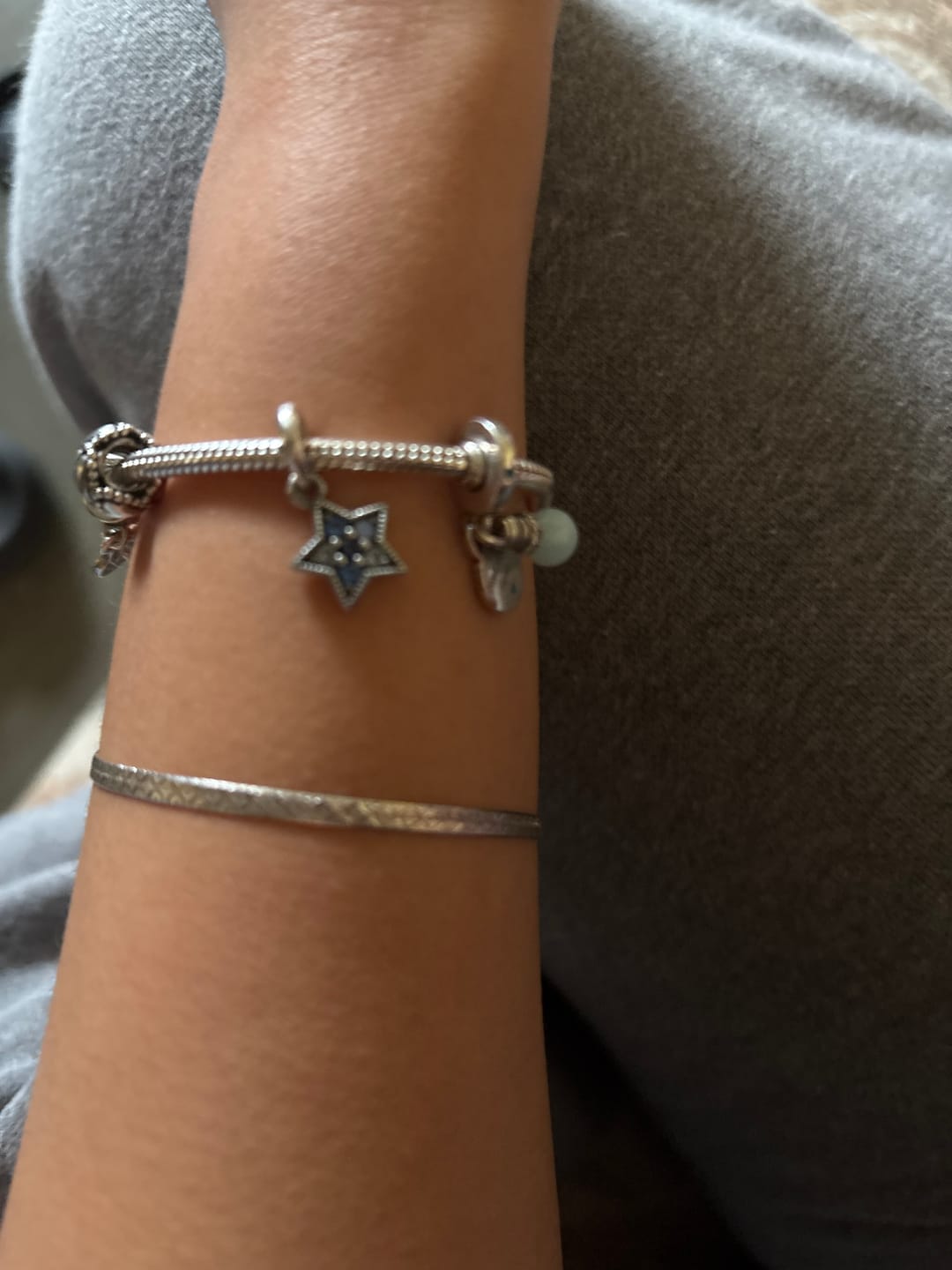 Customer photo review of PANDORA Bright Star Sterling Silver Pendant Dangle Charm