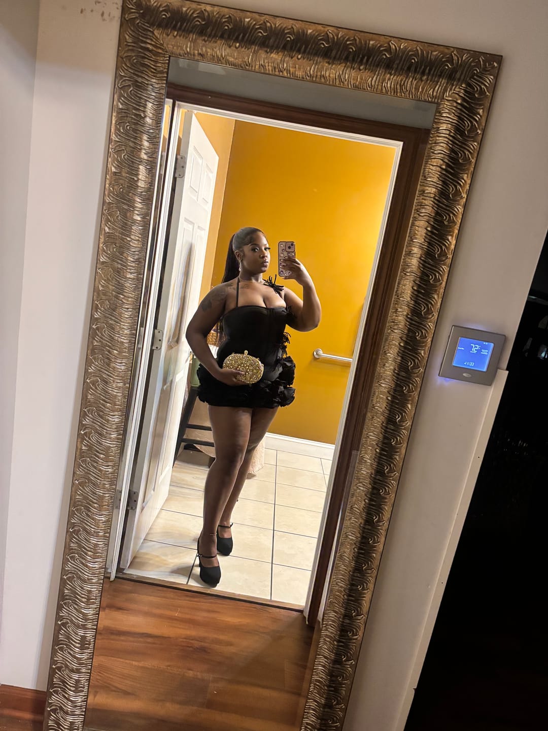 Customer photo review of Neveah Mini Dress