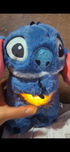 Customer photo review of 🧸 Peluche Interactivo de Stitch – Con Luz, Música y Movimiento