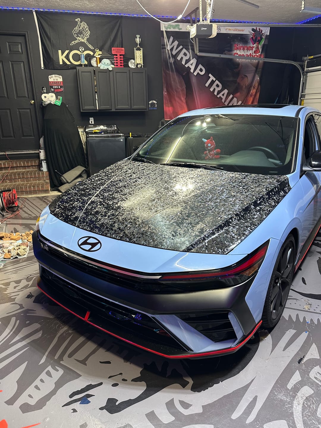 Customer photo review of Shadow Forged Black Carbon Fiber Vinyl Wrap