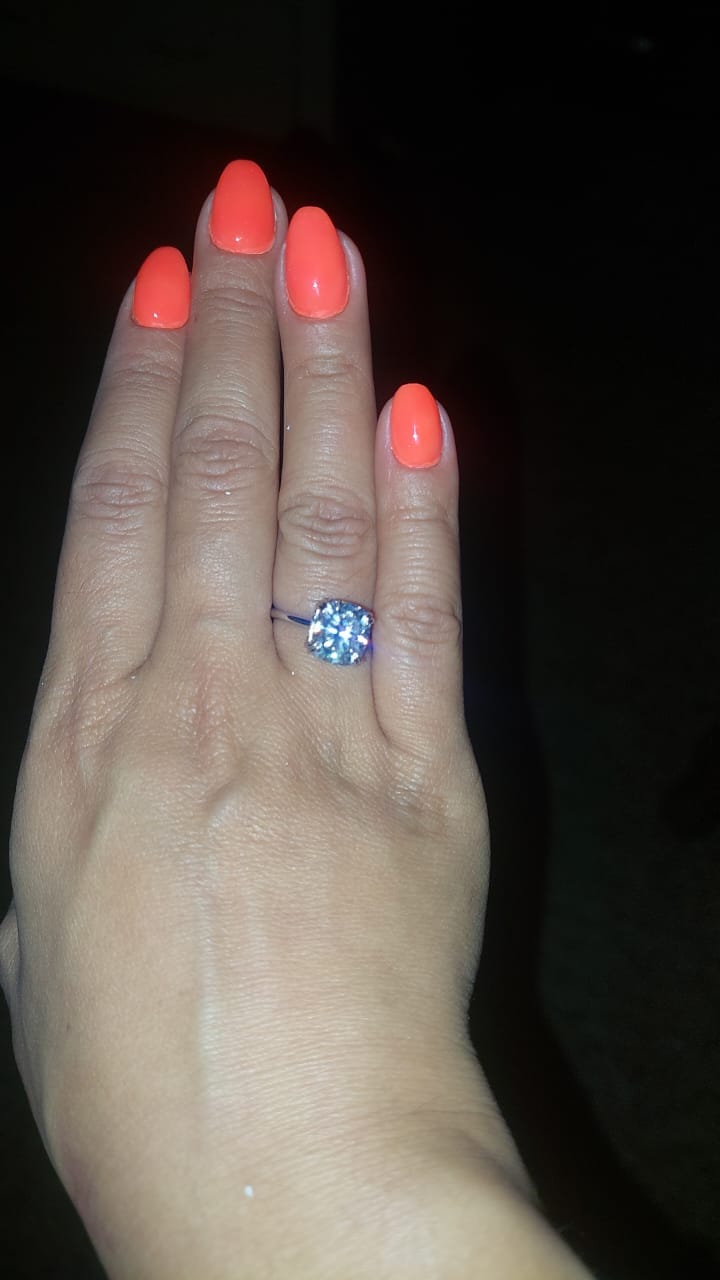 Customer photo review of S925 Moissanite 0.5 CT Round Cut Half Eternity Thin Women's Wedding Band Stackable Ring