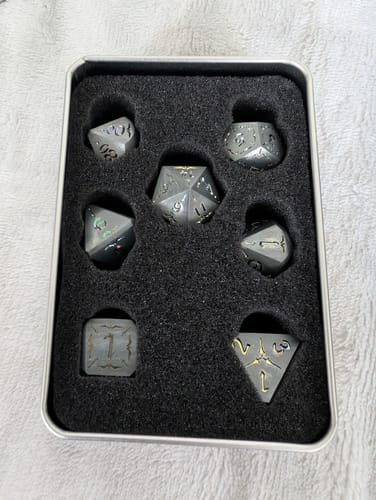 Customer photo review of Sword of the Holy Knight Metal Dice Set