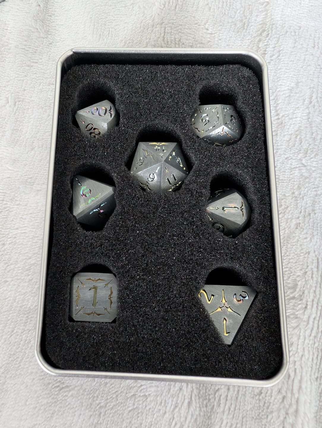 Customer photo review of Sword of the Holy Knight Metal Dice Set
