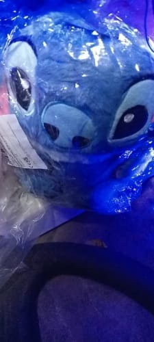 Customer photo review of 🧸 Peluche Interactivo de Stitch – Con Luz, Música y Movimiento