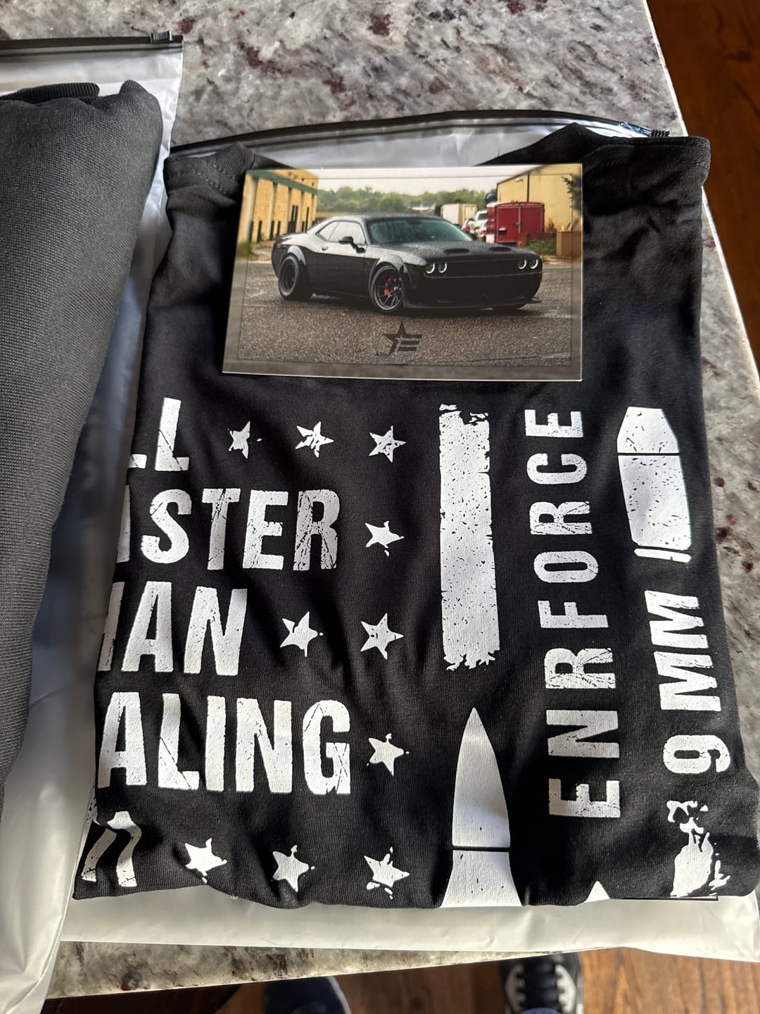 Customer photo review of All Faster Than Dialing 911 Tee