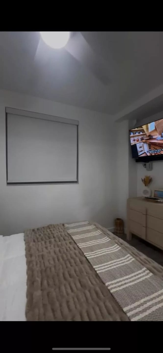 Customer photo review of Bringnox Motorized Roller Shades 100% Blackout Vinyl