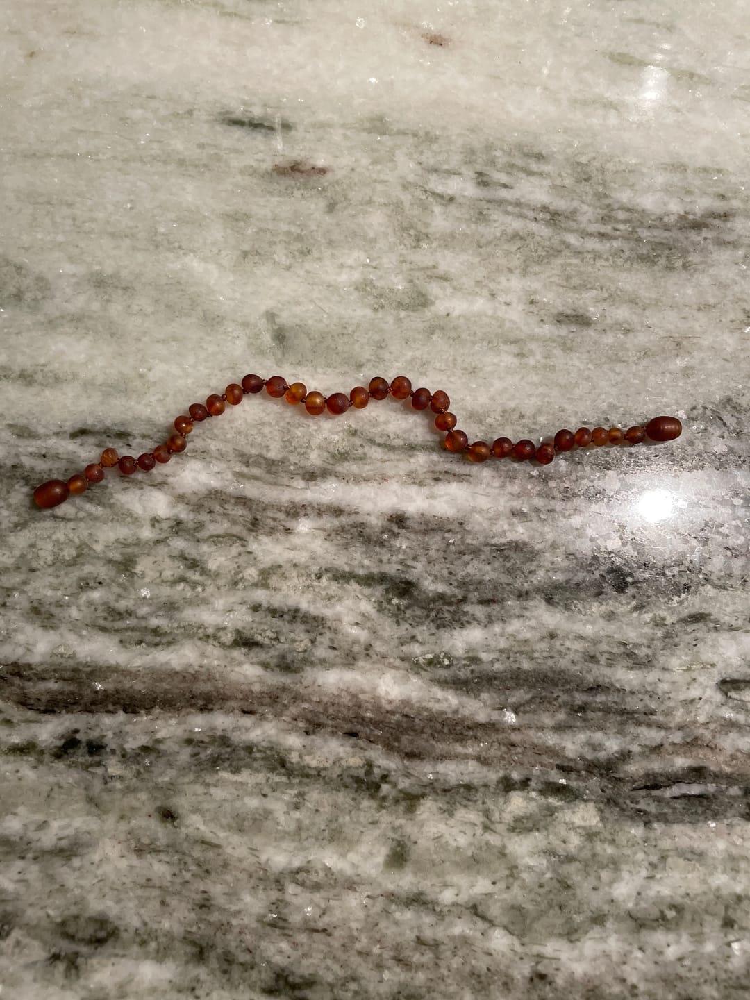 Customer photo review of Raw Cognac Baltic Amber || Anklet or Bracelet