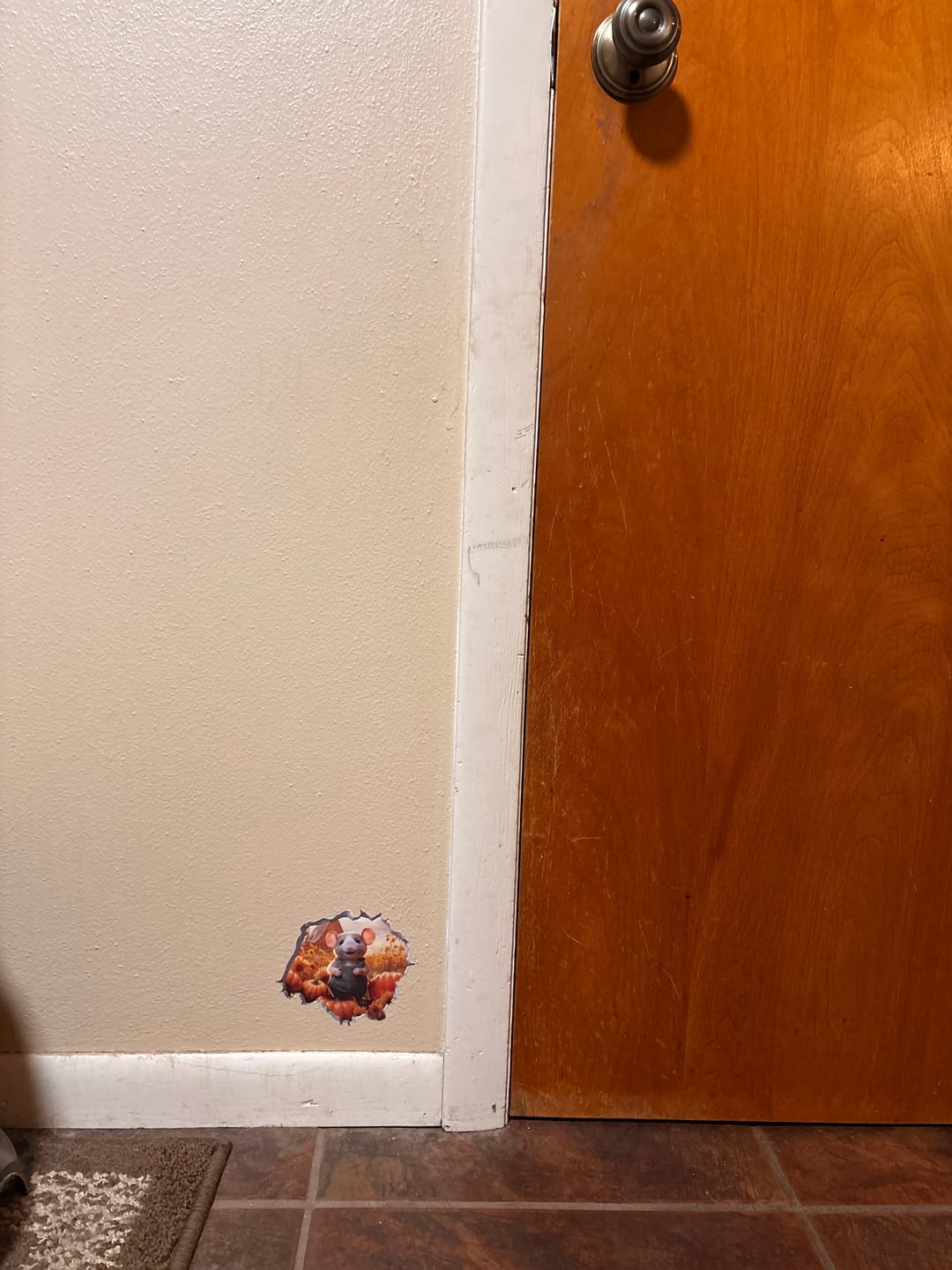 Customer photo review of Pumpkin Patch Mouse Hole Decal