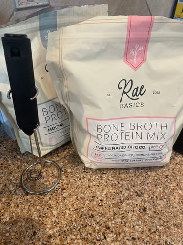 Customer photo of Rae Basics Caffeinated Choco and Mocha bags with a milk frother