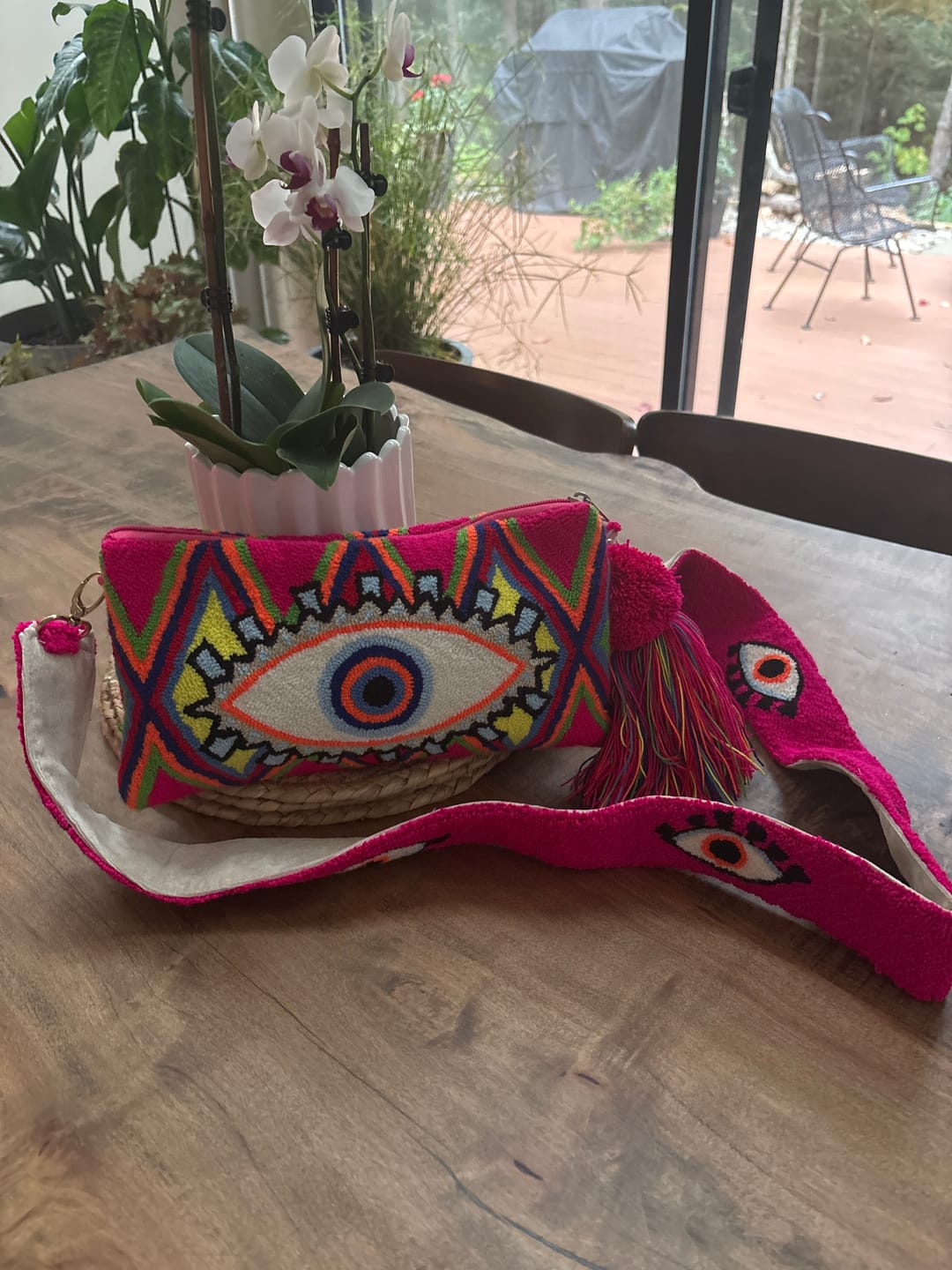 Customer photo review of Rosa Evil Eye Clutch + Removable Strap