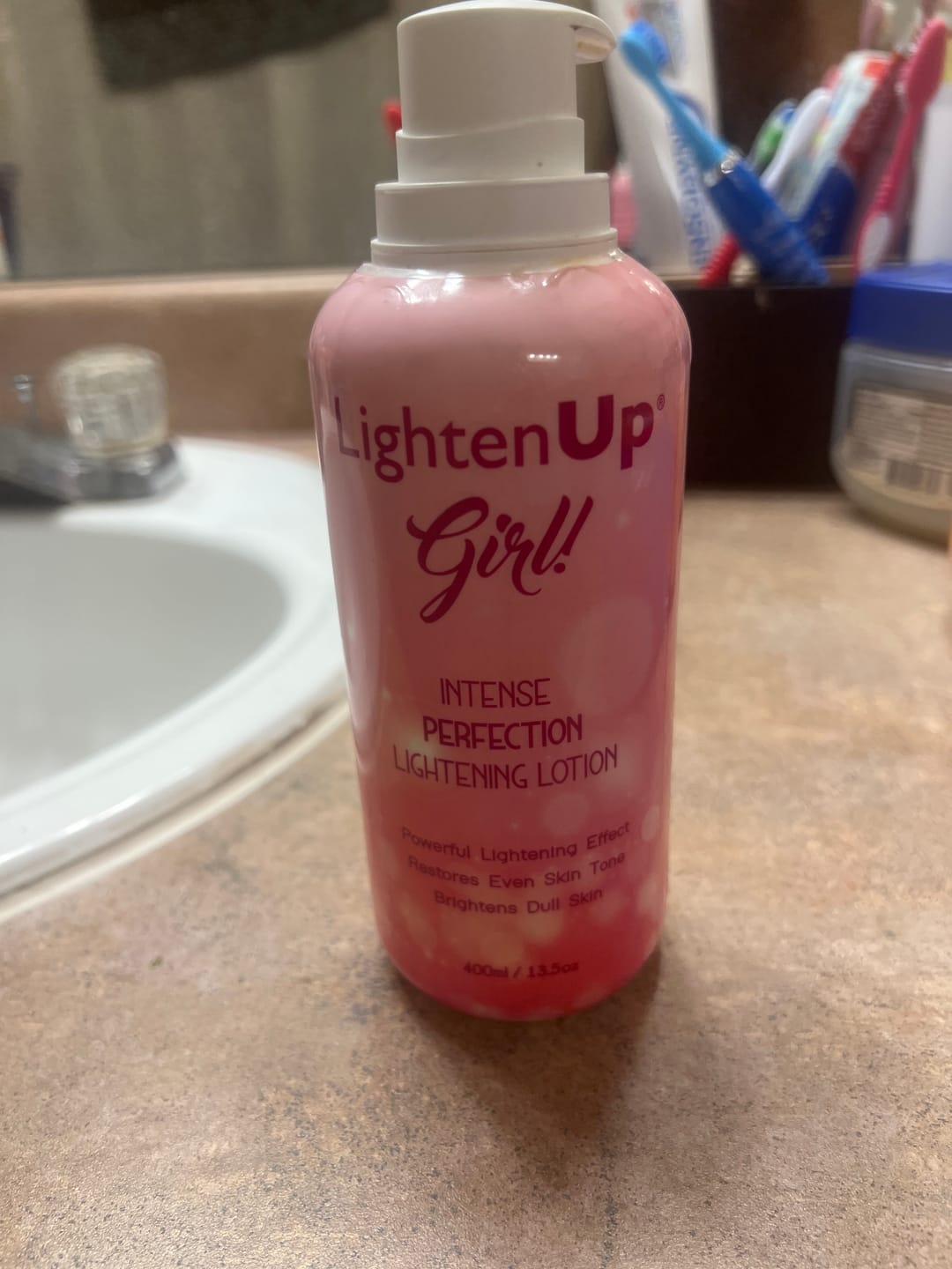 Customer photo review of LightenUp Girl! Intense Perfection Lightening Lotion - 400ml / 13.5 Oz
