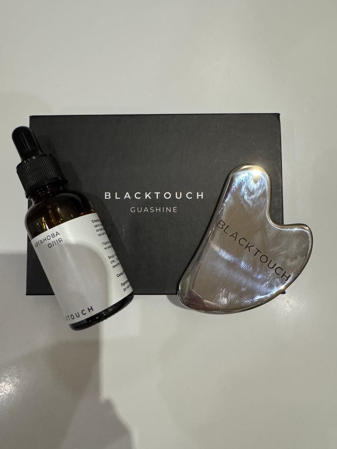 Customer photo review of Комплект "Steel gua sha & cosmetic oil"