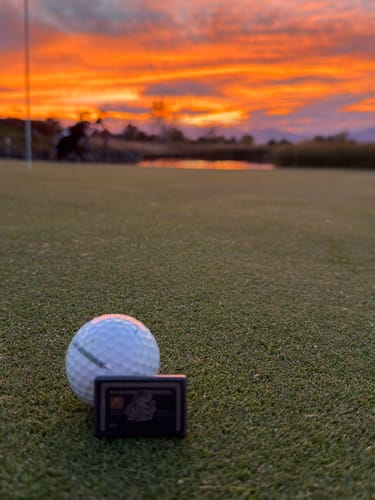 Customer photo review of The Black Card | Kraken Titanium Golf Ball Marker