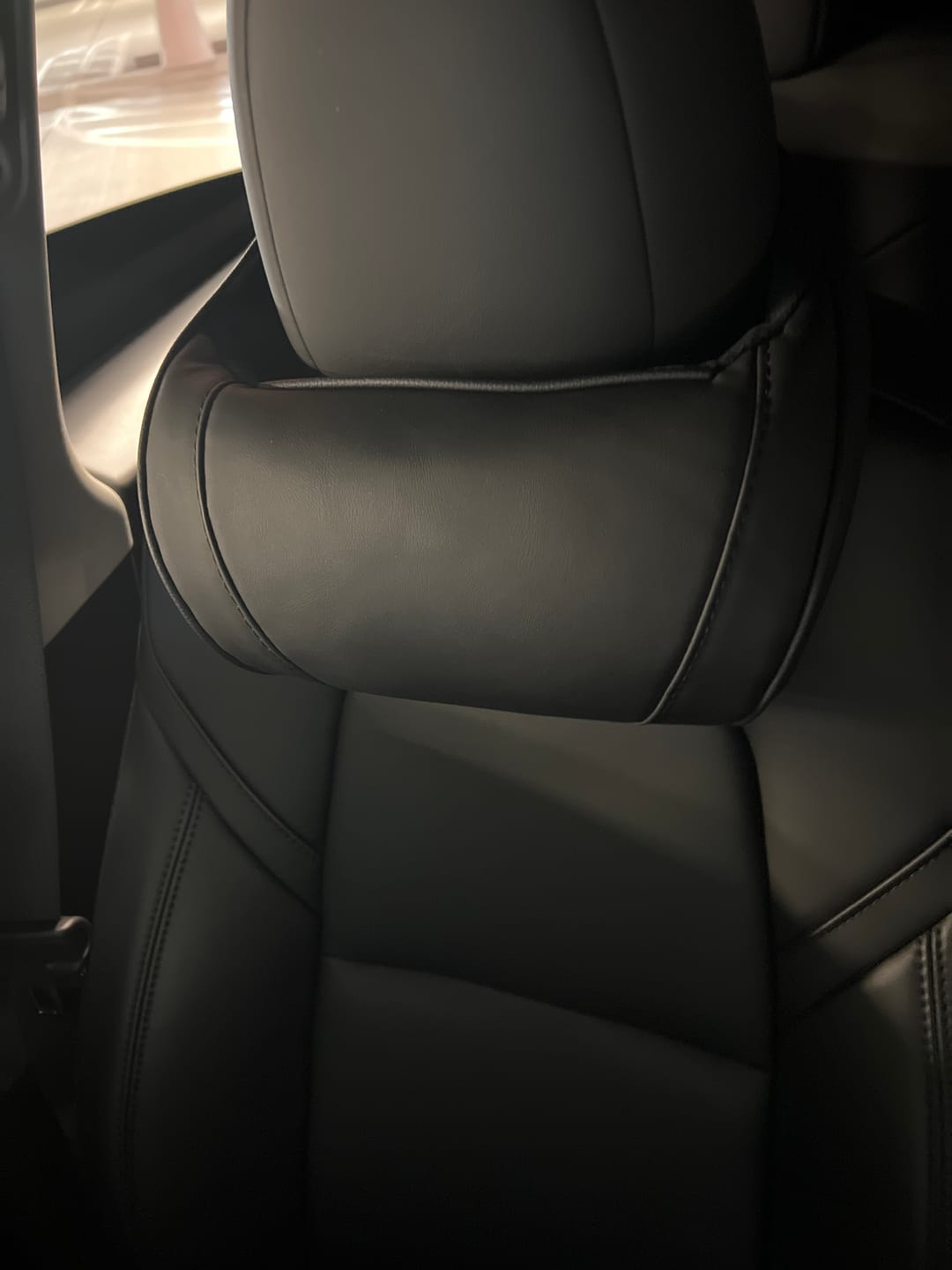 Customer photo review of EVAAM® Leather Neck Support Pillow for Tesla Accessories (1 PC)