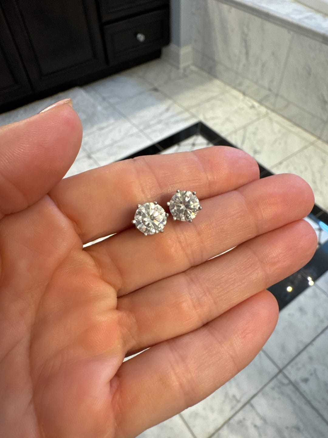 Customer photo review of Round Solitaire Stud Earrings - 6 Prongs - Moissanite