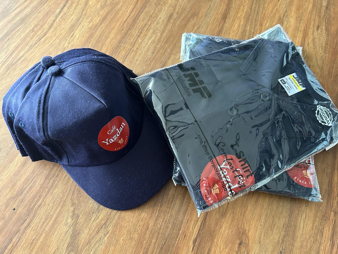 Customer photo review of Customized Polo T-Shirt & Cap  | With Your Company Logo | PrintMine.in