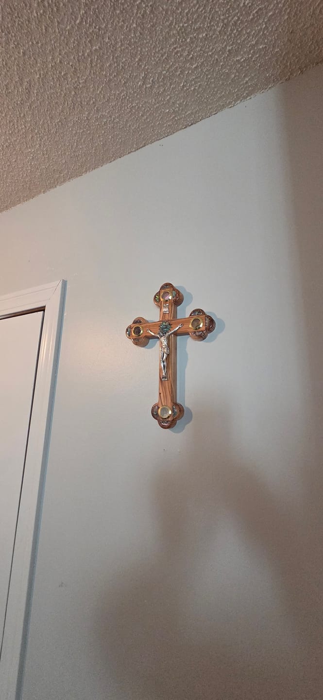 Customer photo review of Olive Wood Crucifix (Partially covered with Mother of Pearl) - Holy Land Crucifixes