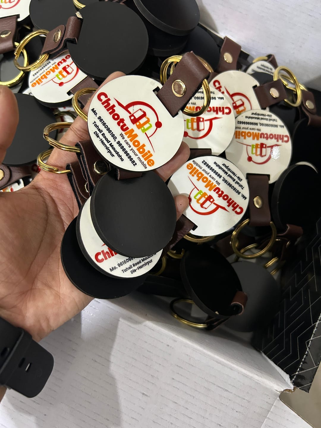 Customer photo review of Customized Premium Belt Keychains | Best for Brand Promotion | PrintMine.in