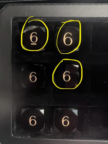 Customer photo review of URWizards D&D Multi-faceted Gemstone Engraved Dice Set