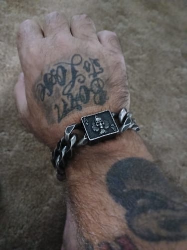 Customer photo review of Revenant’s Wrath Ace of Spades Cuban Link Bracelet: Helps Pair Veterans With A Service Dog or Shelter Dog