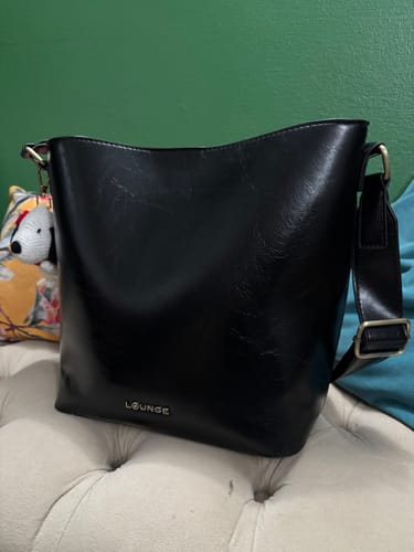 Reseña con foto de un cliente sobre Cartera Bandolera Éclat
