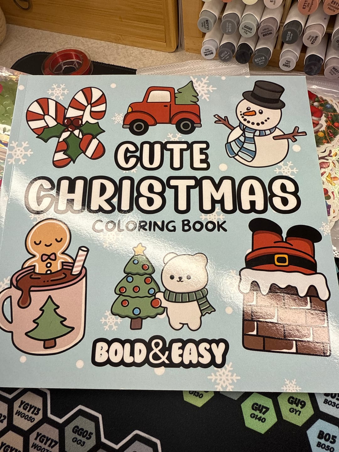Customer photo review of Cute Christmas Coloring Book & Reusable Protective Sheet