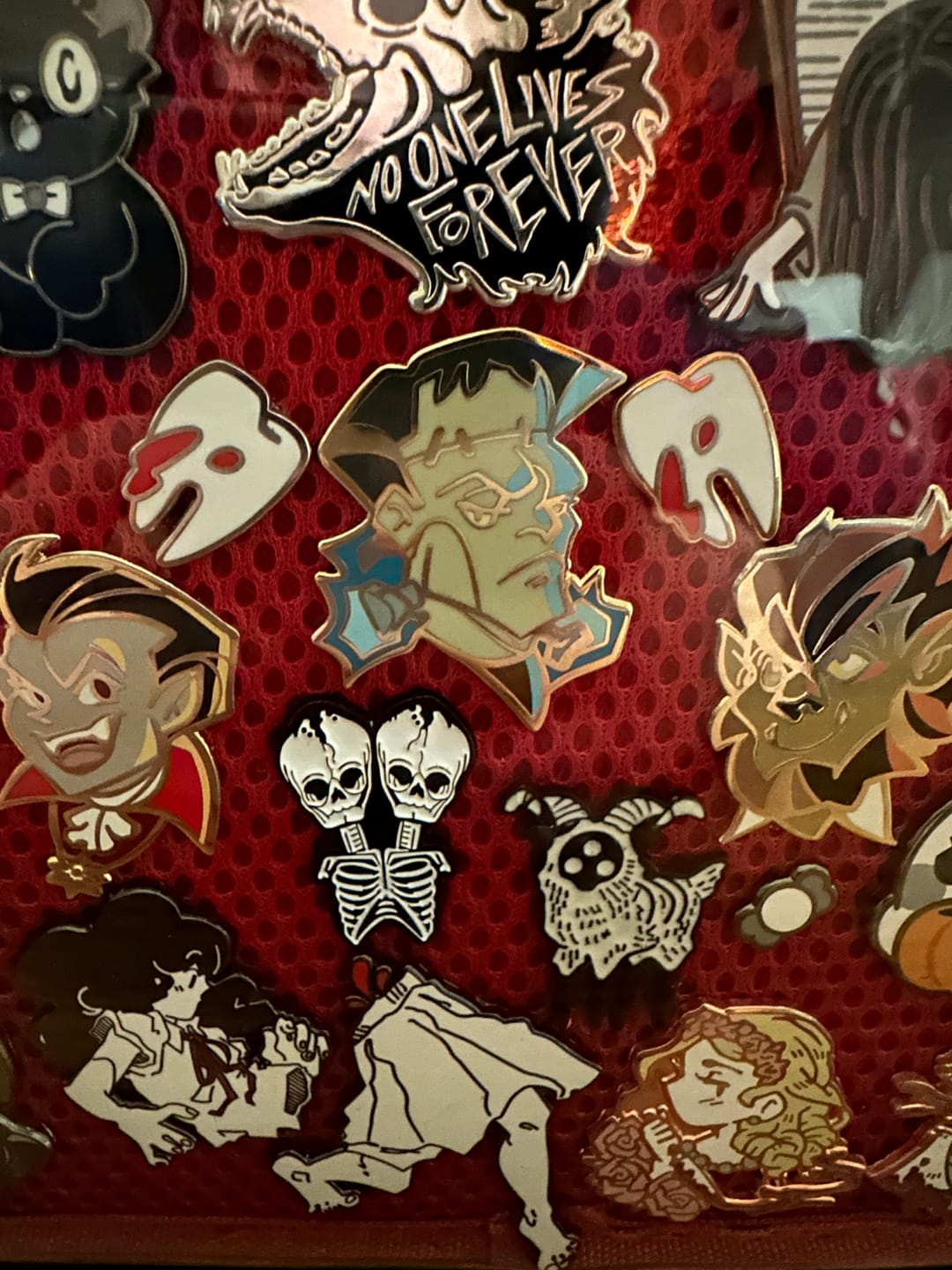 Customer photo review of Tiny Teeth Enamel Pins
