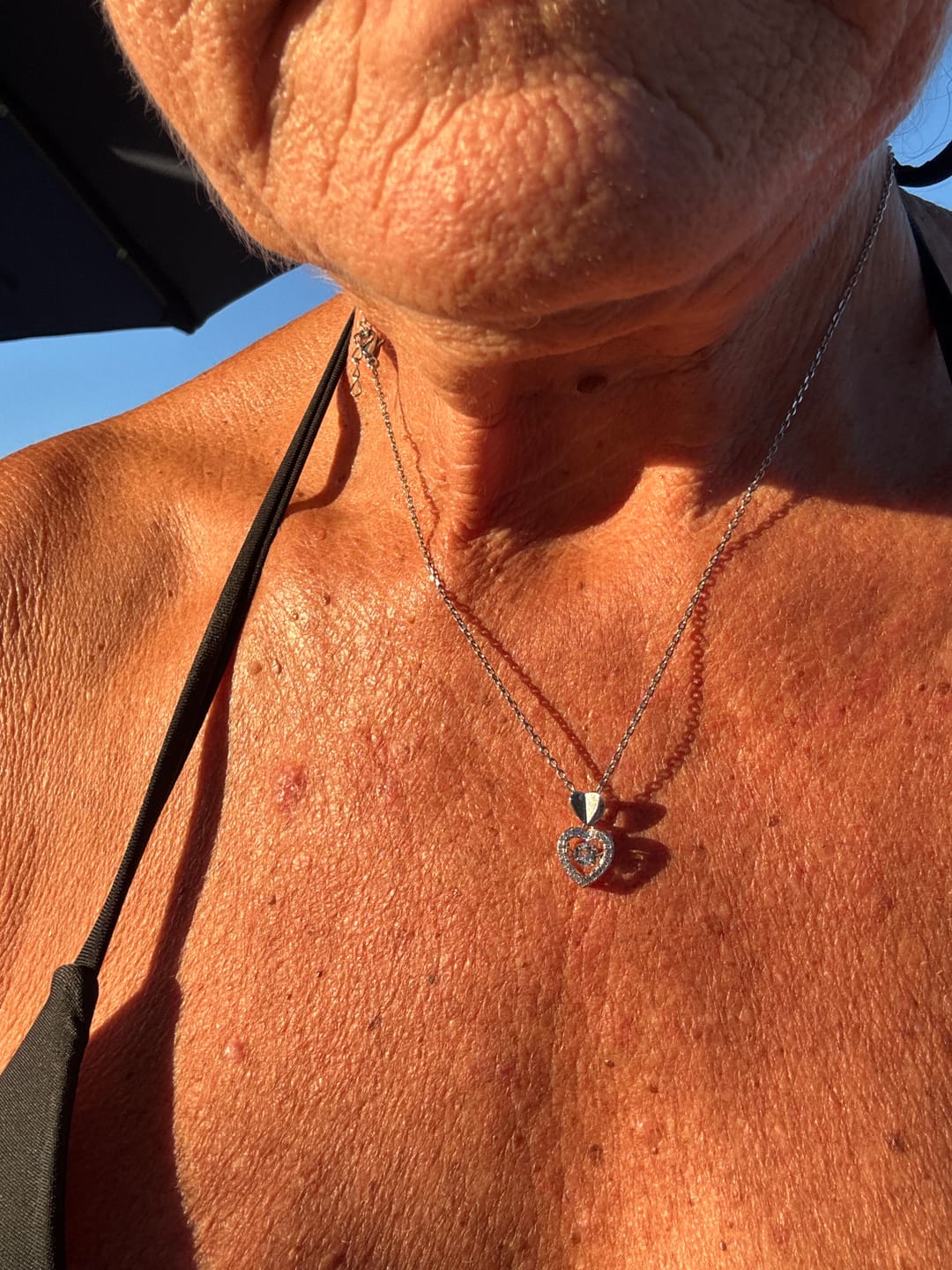 Customer photo review of Shelby 18k White Gold Plated Heart Dancing Necklace with Swarovski Crystals