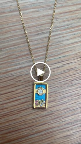Customer video review of The Sun - Tarot card Dainty 18k Necklace with Blue Enamel