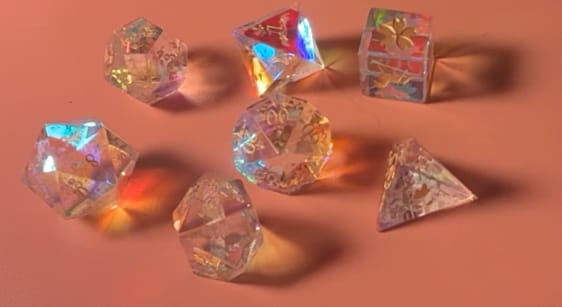 Customer photo review of URWizards D&D Dichroic Prism  Glass Engraved Dice Set Unicorn Style