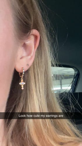 Customer photo review of Isabella Rainbow Gold Cross Huggie Earrings