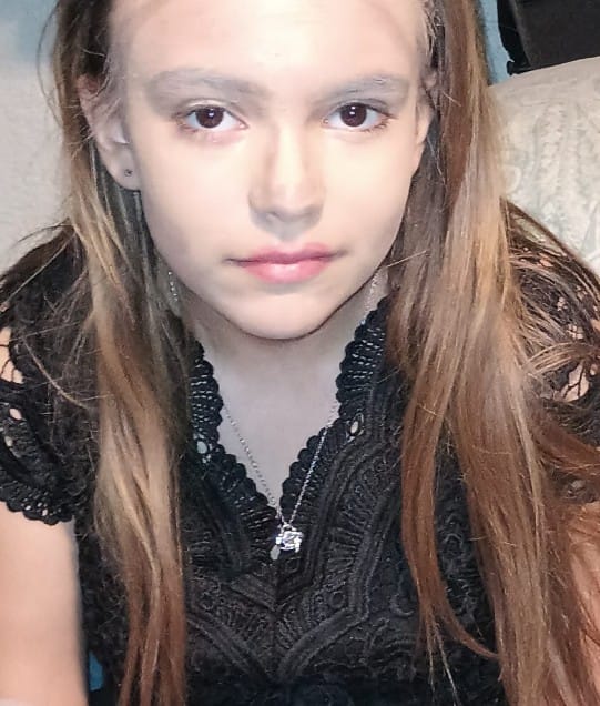 Customer photo review of To My Beautiful Granddaughter - "A Chapter I'll Cherish Forever" Love Knot Necklace Gift Set  - GD07