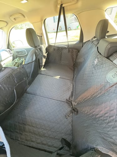 Customer photo review of NEW Waterproof Hard Bottom Car & Truck Seat Foldable Hammock Cover With Storage Pockets, Side Flaps, Headrest Straps, Seat Anchors, & Mesh Window (+FREE SAFETY BELT!)