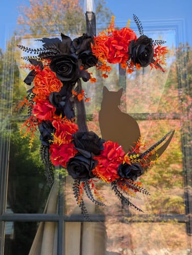 Customer photo review of Crescent Moon Floral Black Cat Wreath, 20" Black and Orange Halloween Door Decoration
