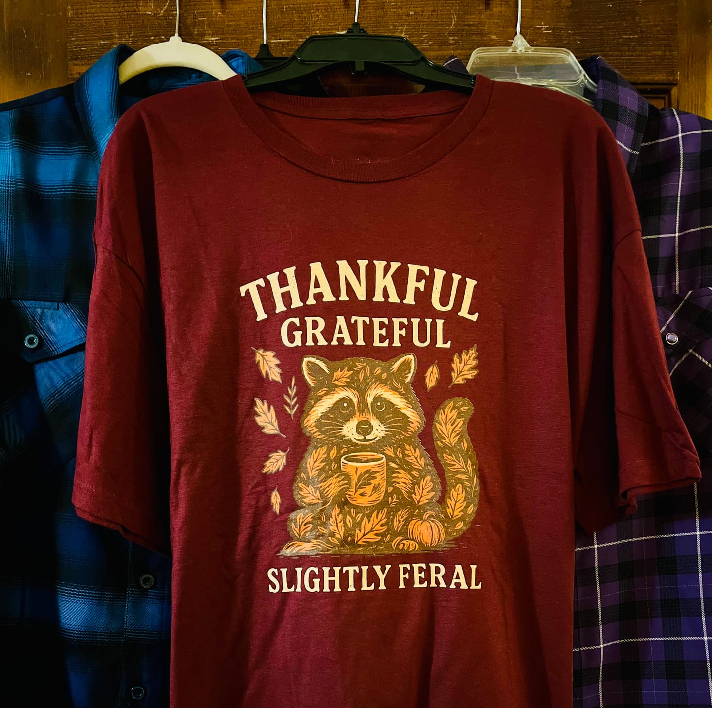Customer photo review of Thankful Grateful Slightly Feral Raccoon Softstyle Tee