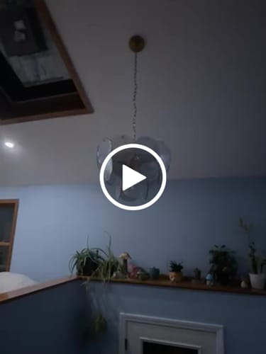 Customer video review of Glam Blue Iridescent Swirl Glass Round Tiered Chandelier