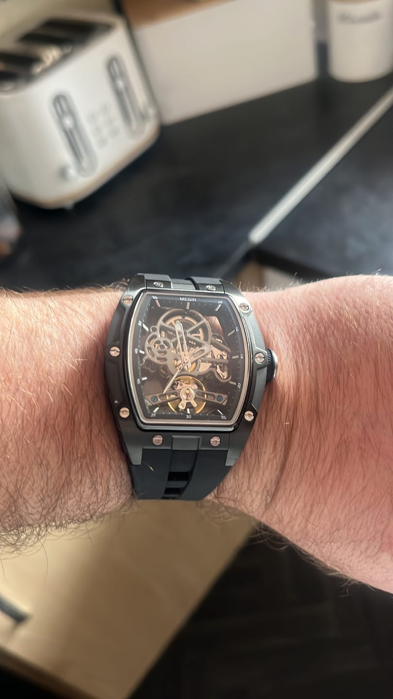 Customer photo review of Latest Luxury Design -Skeleton Face With Rubber Strap Mechanical Movement Waterproof Watch