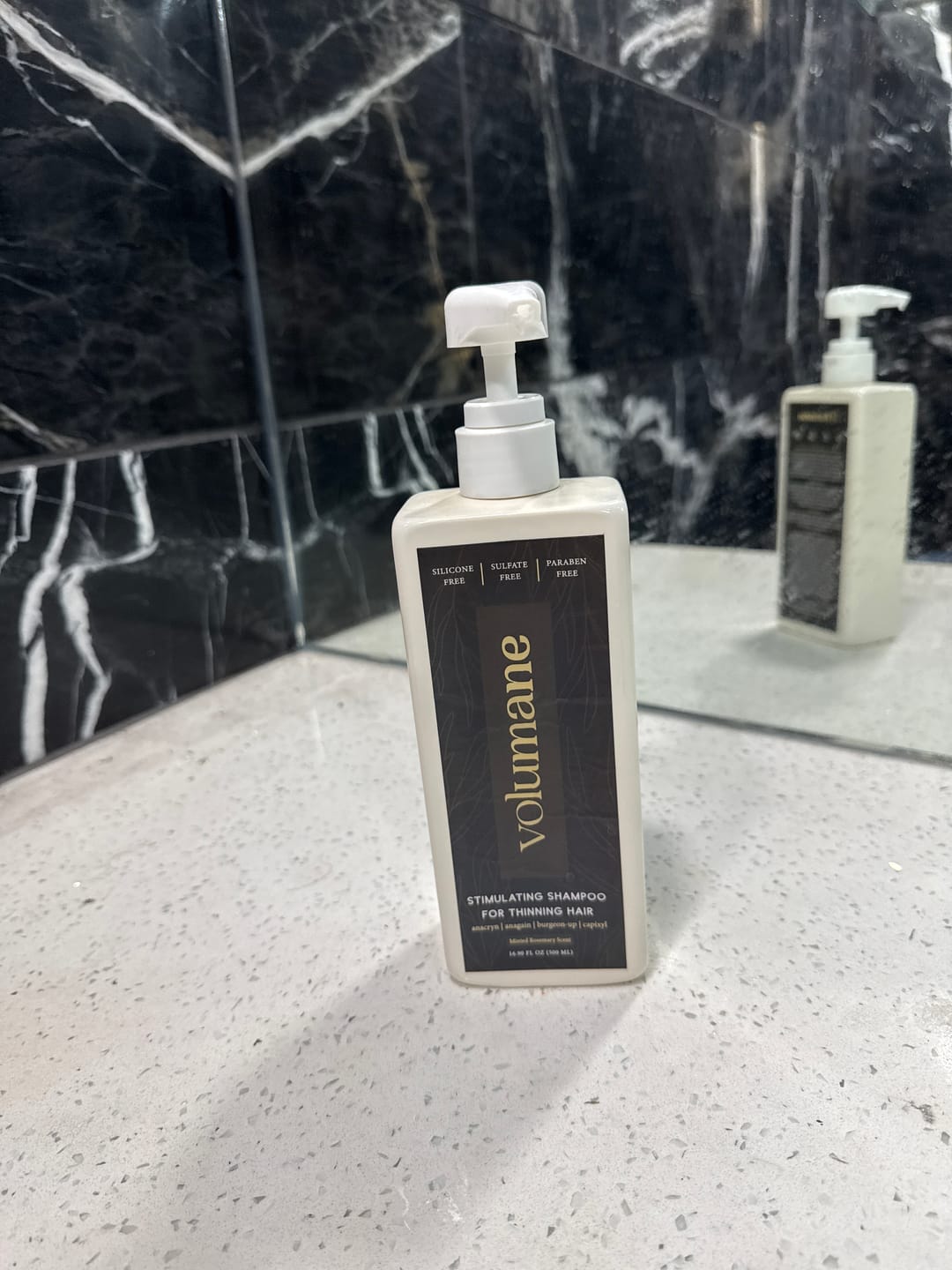Customer photo review of Volumane Anti-Thinning Stimulating Shampoo