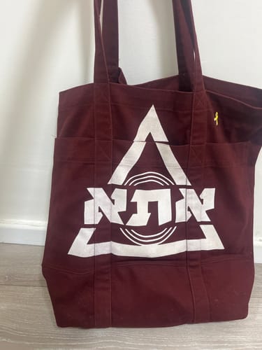 Customer photo review of תיק לוגו אתא משולש