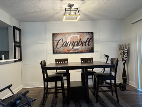 Customer photo review of Family Last Name Sign