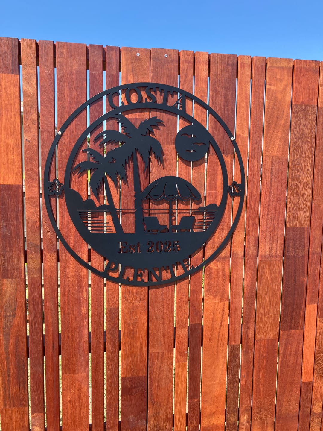 Customer photo review of Beach Palm Metal Sign