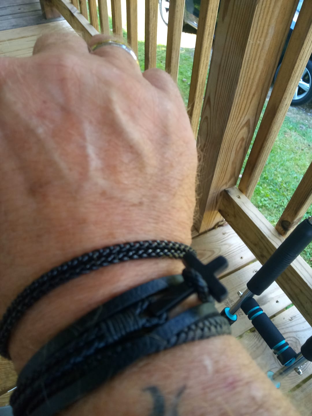 Customer photo review of FREE Today: Tri - Color Stainless Steel Cross & Braided Leather Fashion Bracelet
