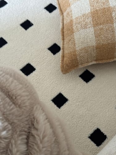 Customer photo review of Black and White Checker Area Rug – Waterproof & Stain-Resistant