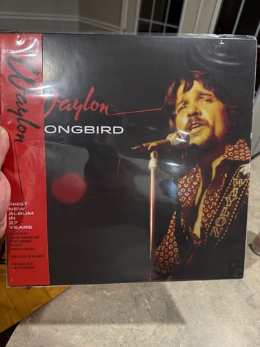 Customer photo review of Waylon Jennings "Songbird" Cowboy Red Smoke Vinyl LP Pre-Order