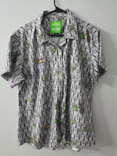 Customer photo review of Sesame Street "Scram!" – Women's KUNUFLEX Short Sleeve Shirt
