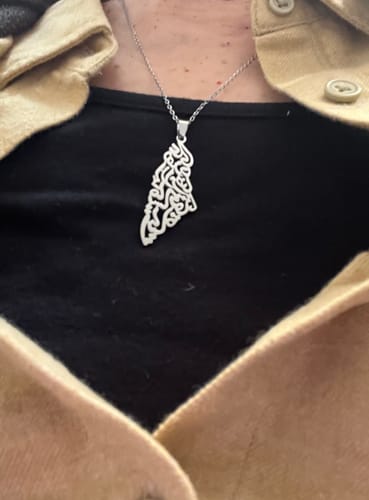 Customer photo review of Palestine Calligraphy Map Necklace