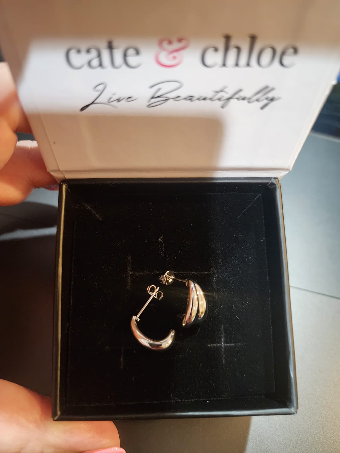Customer photo review of Shae 18k White Gold Plated Semi-Hoop Curved Stud Earrings